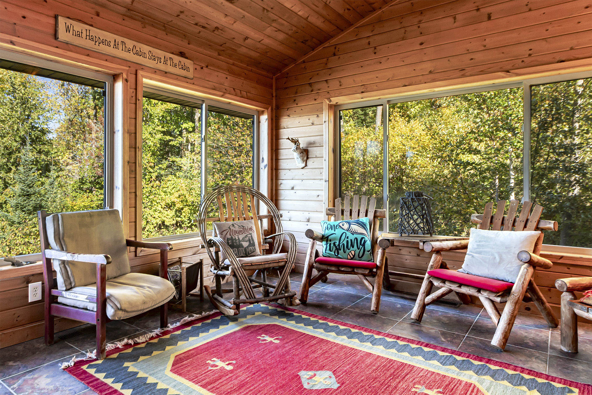 Cozy rustic sunroom seating area